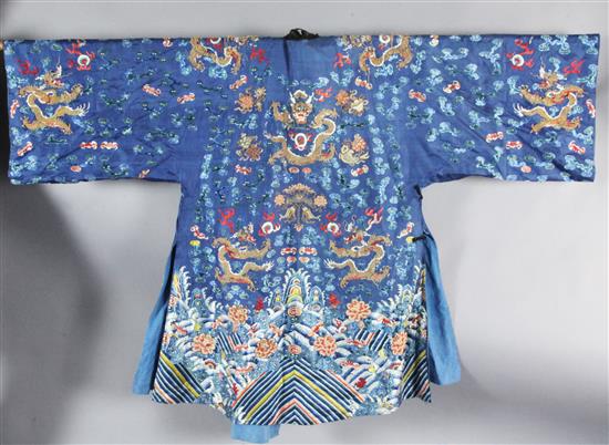 A Chinese embroidered silk and metal thread dragon robe, late 19th / early 20th century, faults